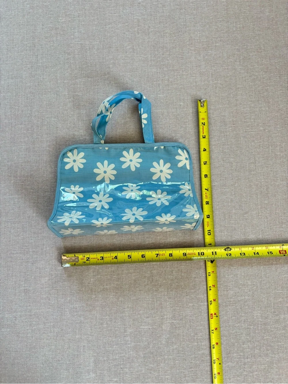 Vintage blue daisy boho vinyl clutch pouch.